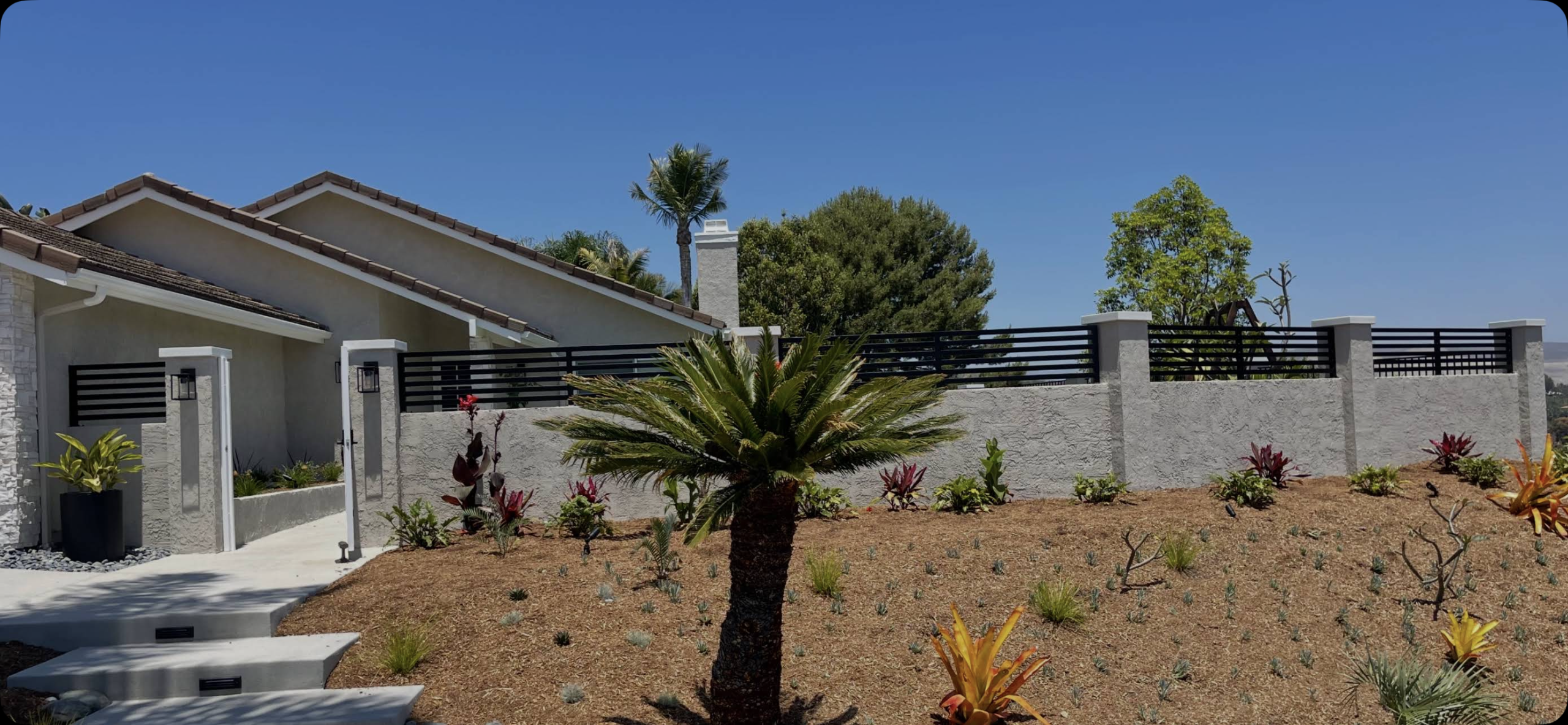 Horizontal linear design slat fence panels .San Clemente